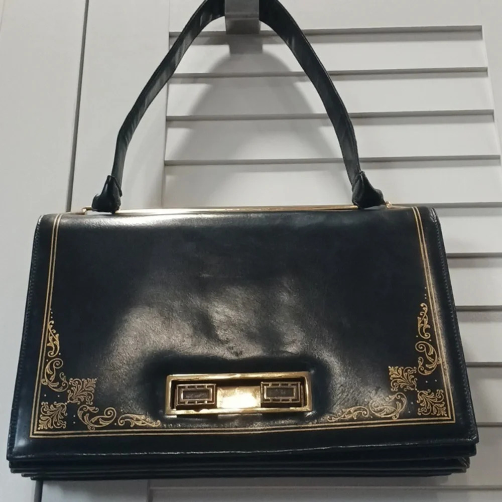 Black Shoulder Bag with Gold Accents